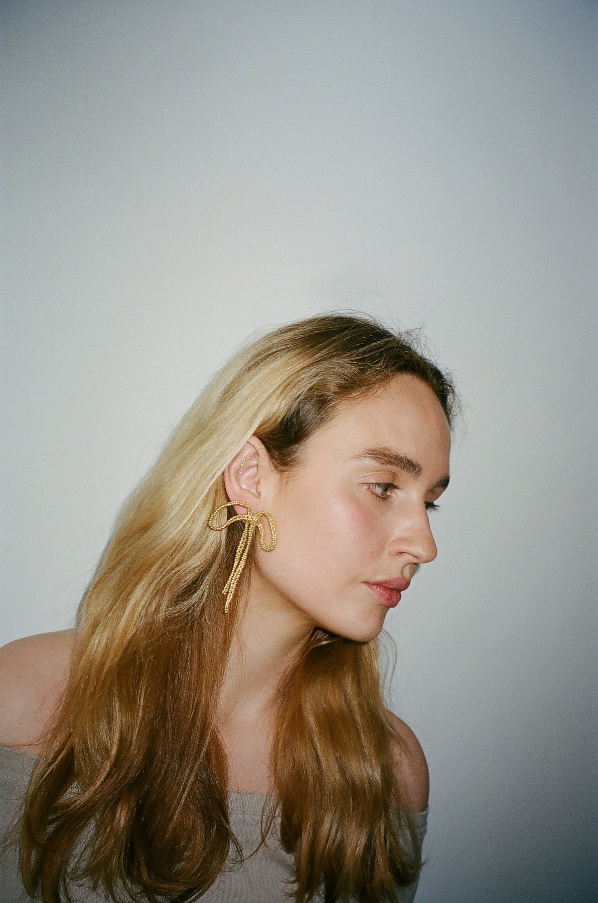 GOLD BIG BOW EAR STICKS