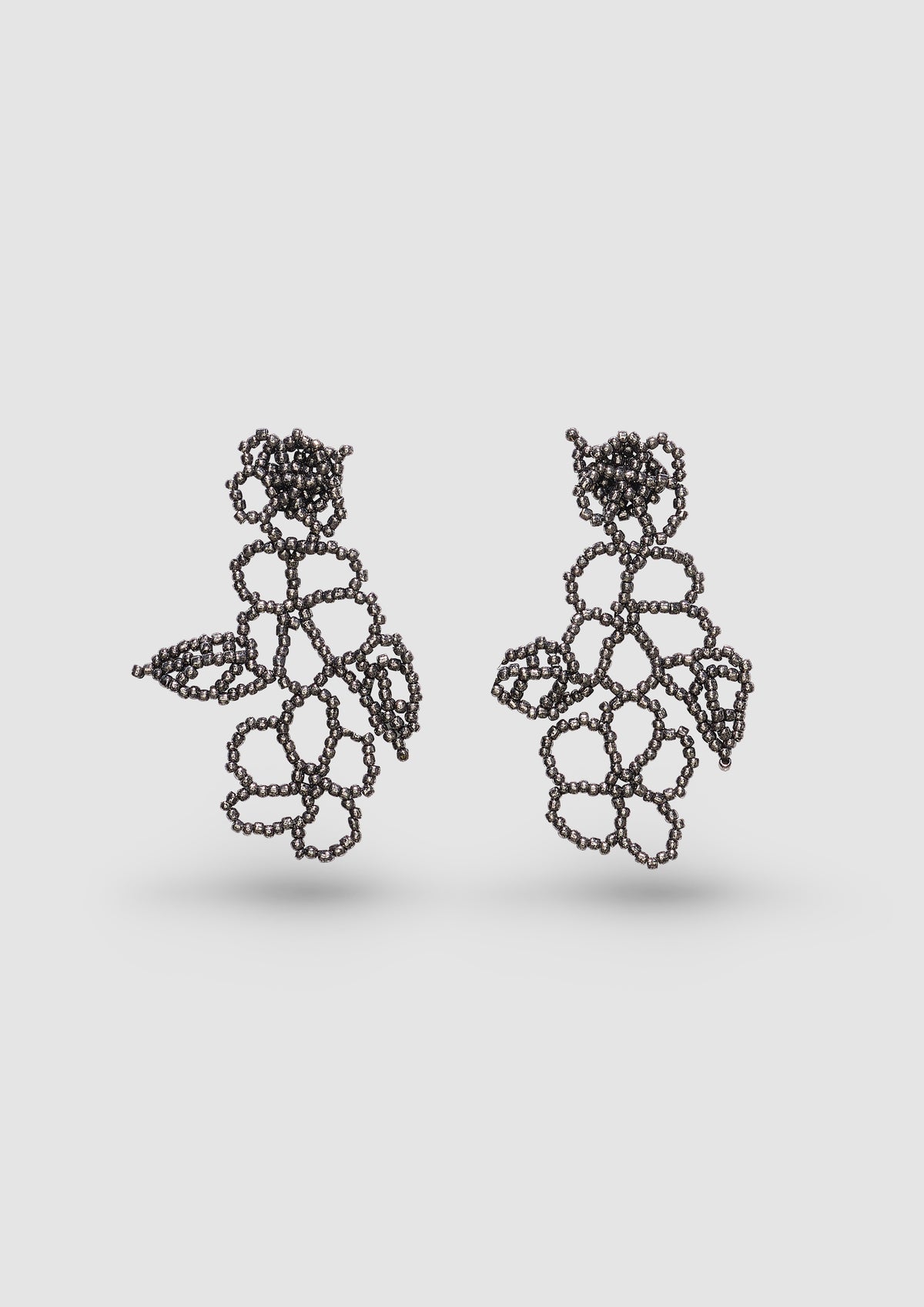 BLACK FLOWER EAR STICKS