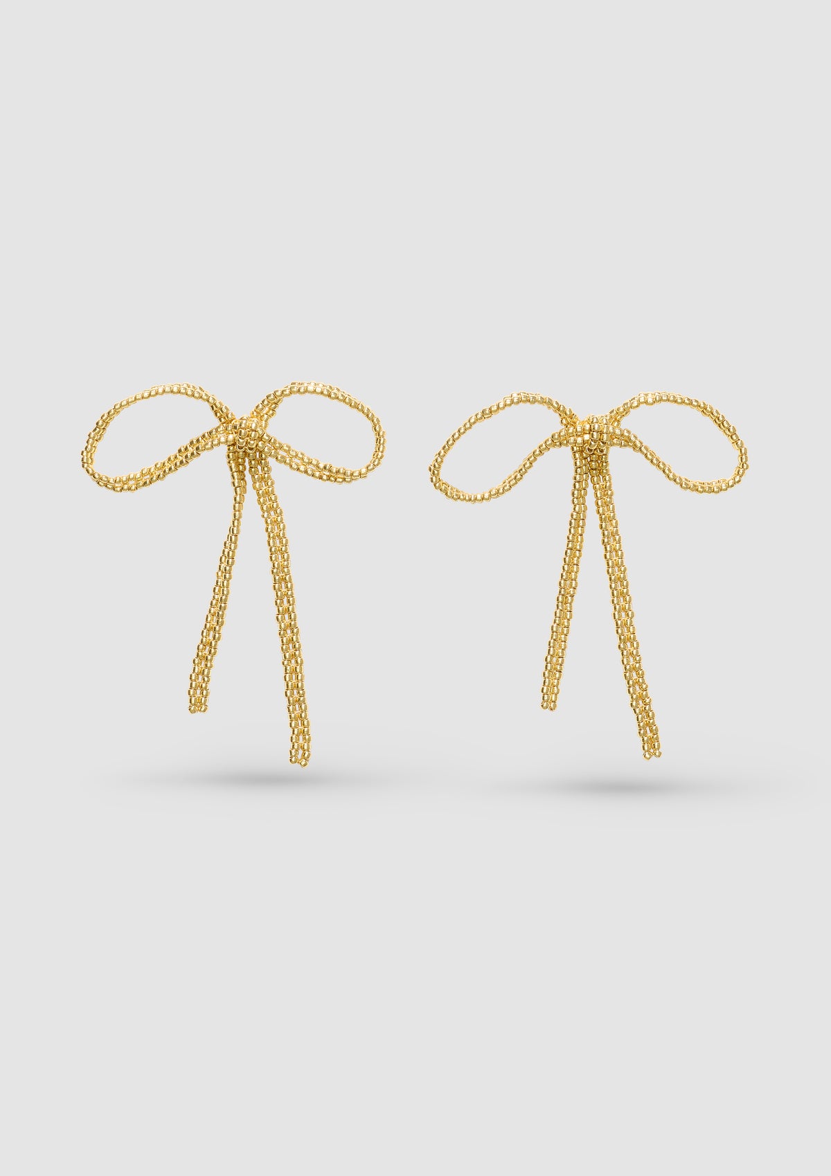 GOLD BIG BOW EAR STICKS