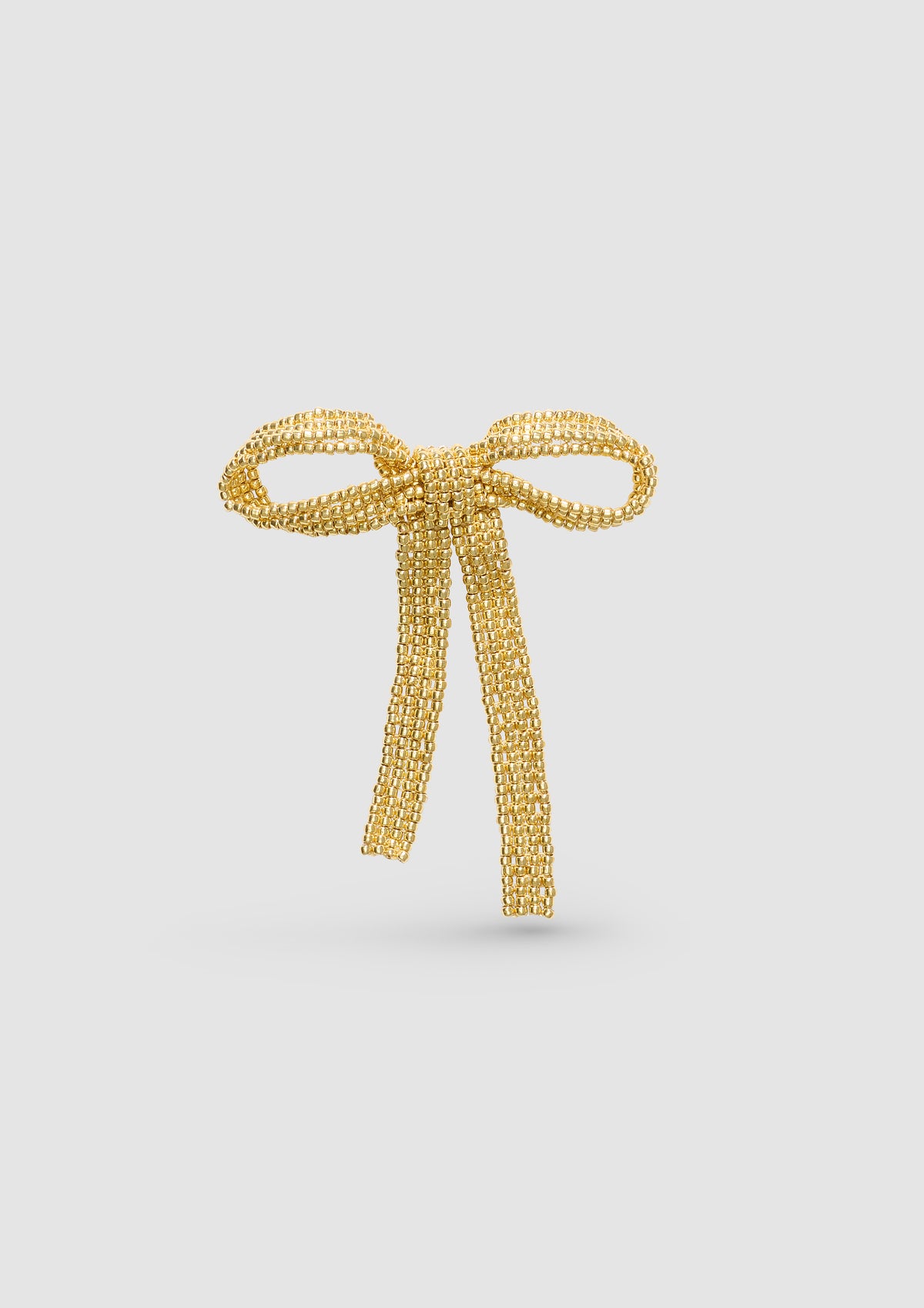 GOLD BOW BROOCH