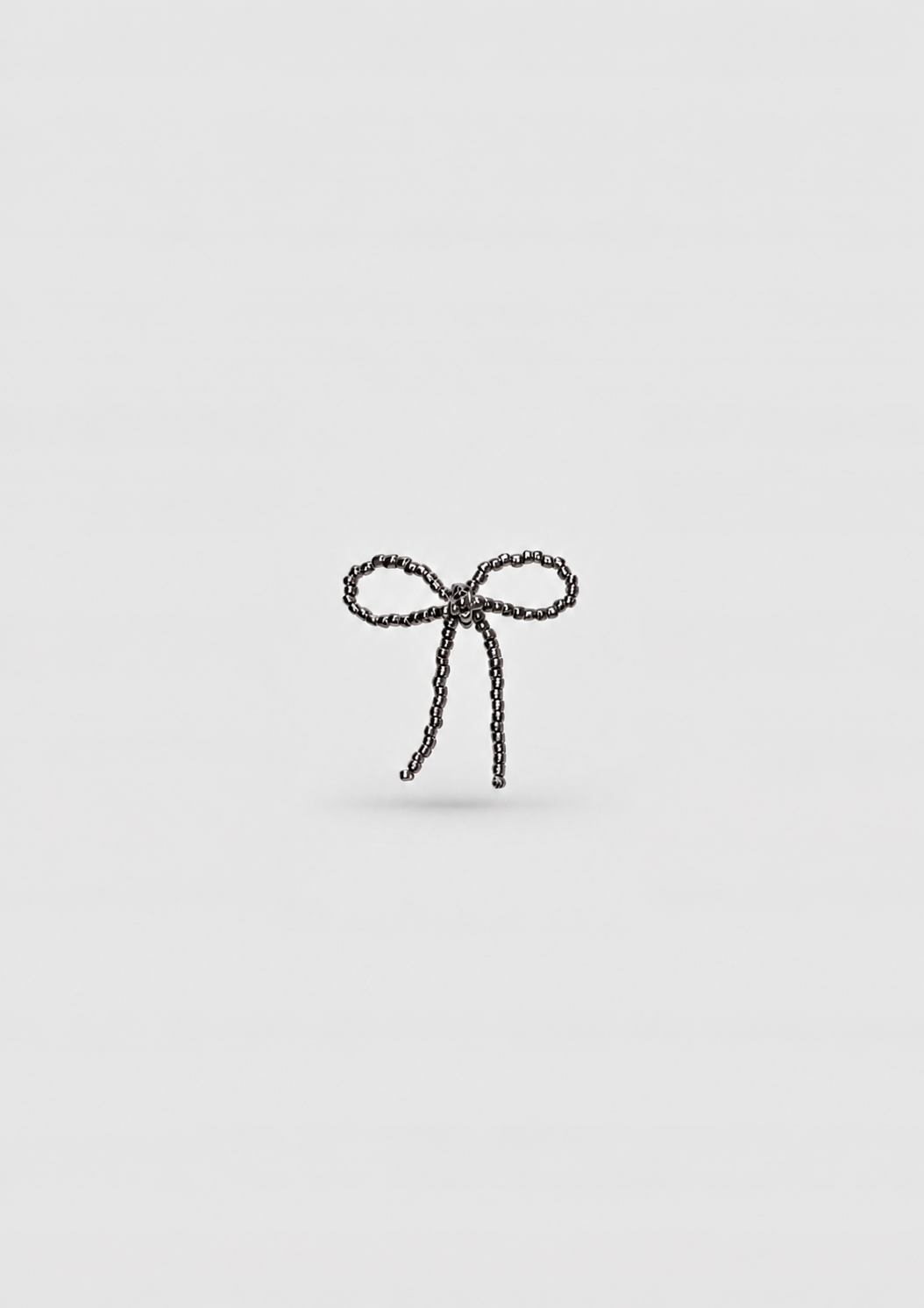 BLACK BOW EAR STICKS
