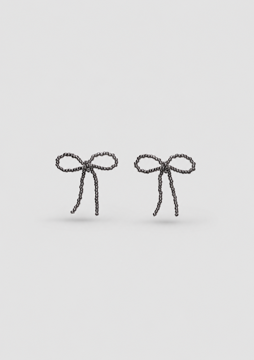 BLACK BOW EAR STICKS