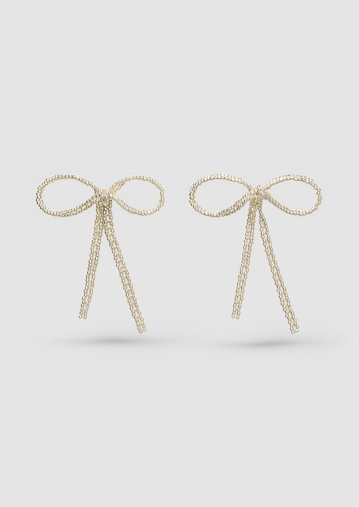 SILVER BIG BOW EAR STICKS