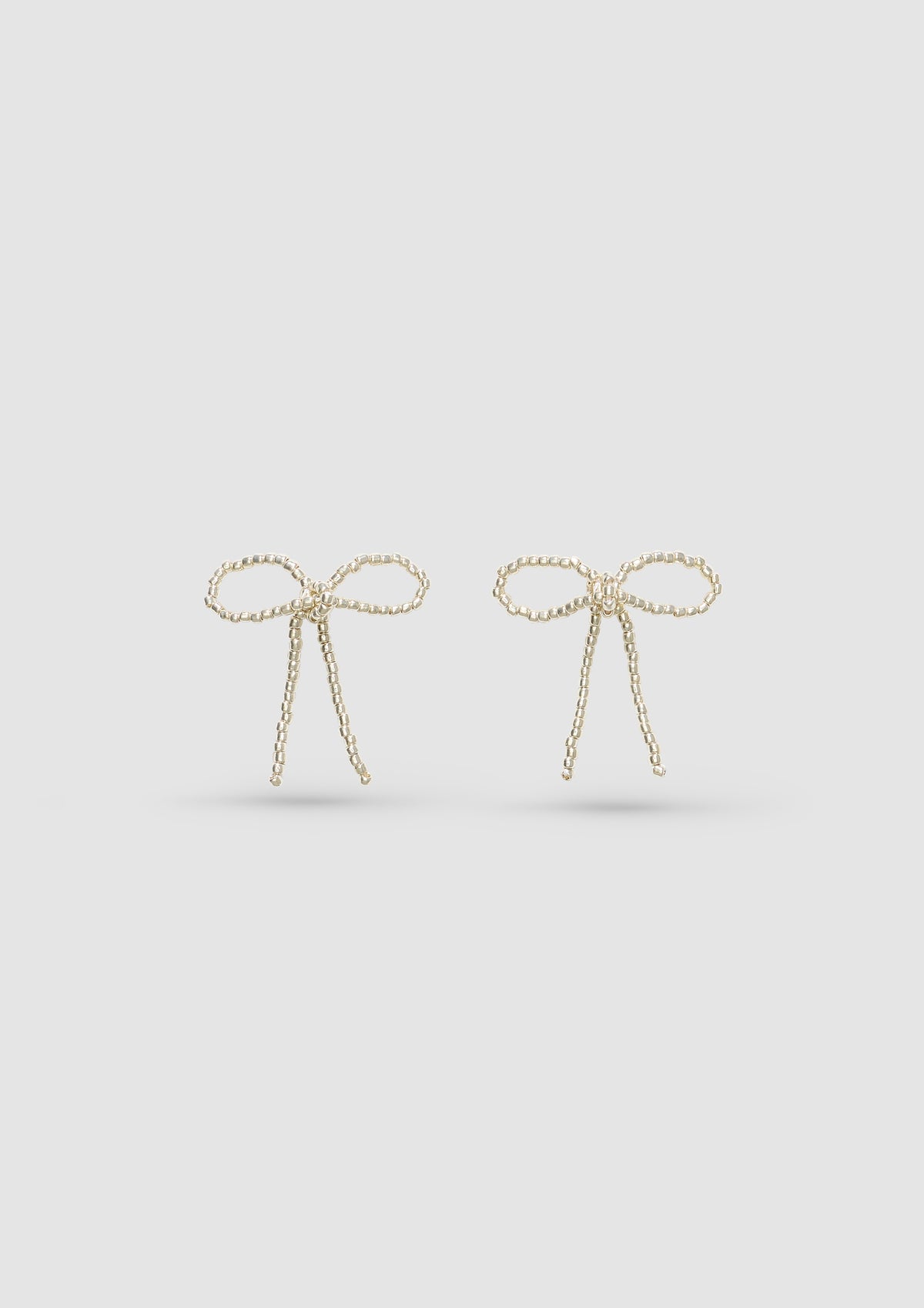 SILVER BOW EAR STICKS
