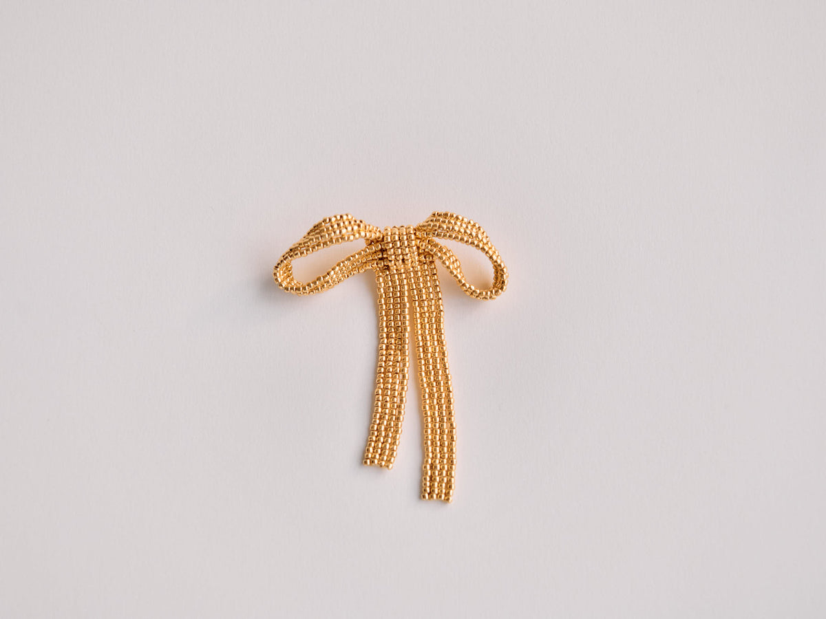 GOLD BOW BROOCH