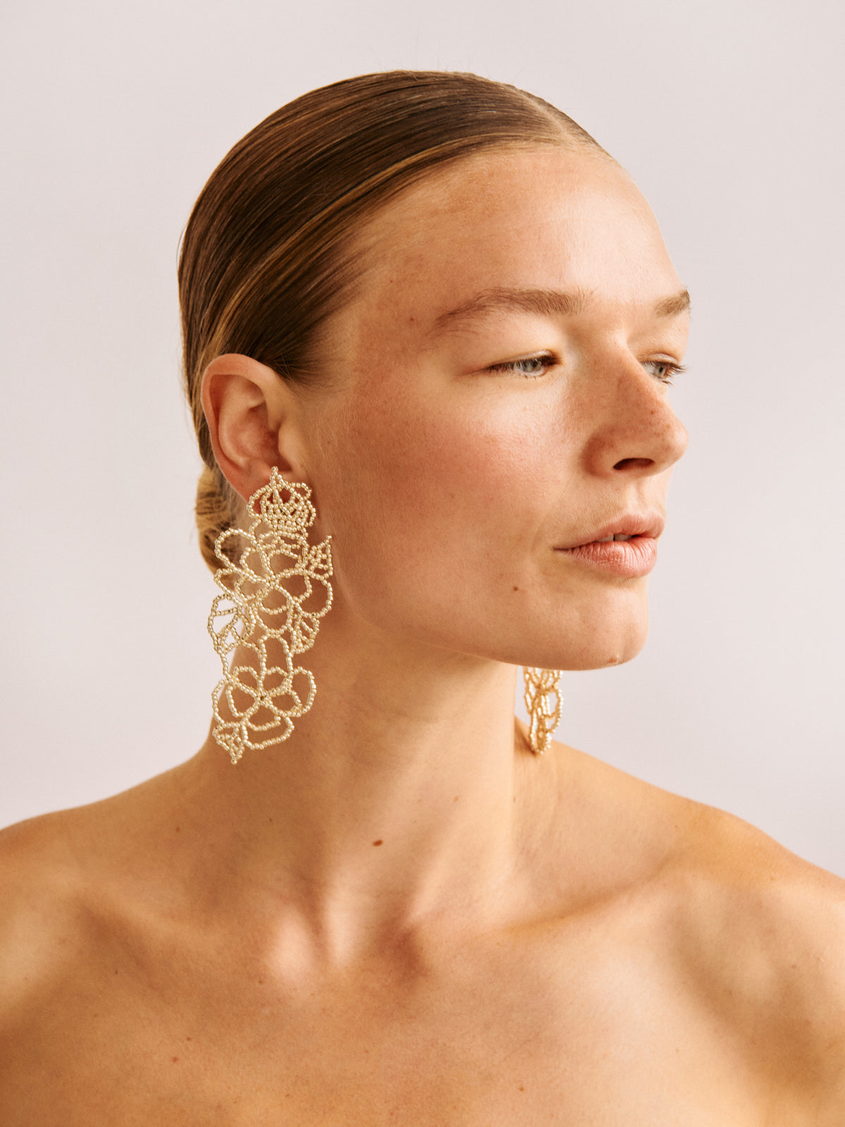 BIG SILVER FLOWER EAR STICKS