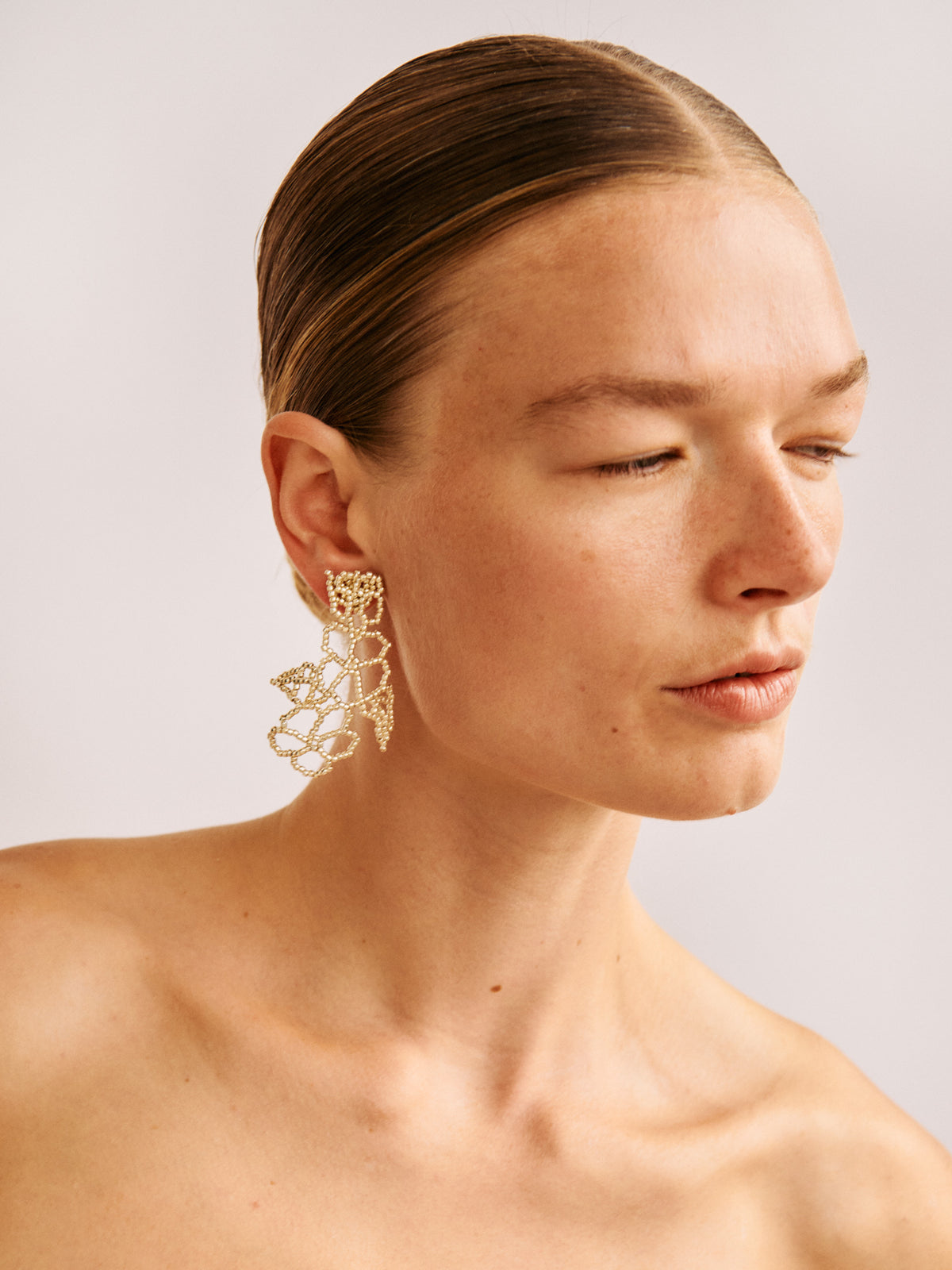 SILVER FLOWER EAR STICKS