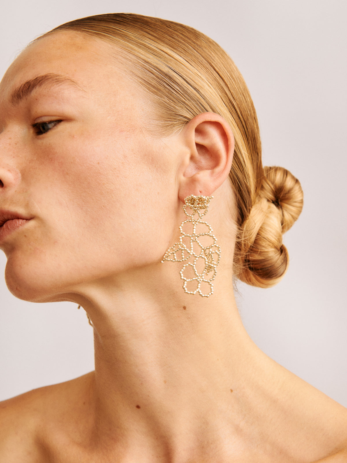 SILVER FLOWER EAR STICKS